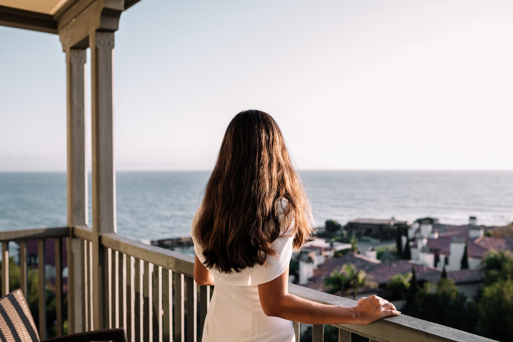 Rachel Off Duty: Woman in White Dress Looking at Ocean View in Terranea Resort
