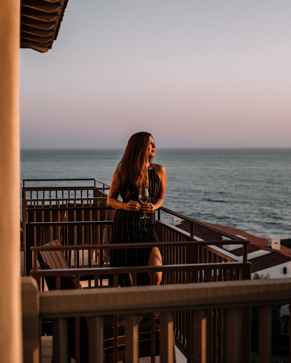 Rachel Off Duty: Woman with a Glass of Wine on Balcony at Sunset in Terranea Resort