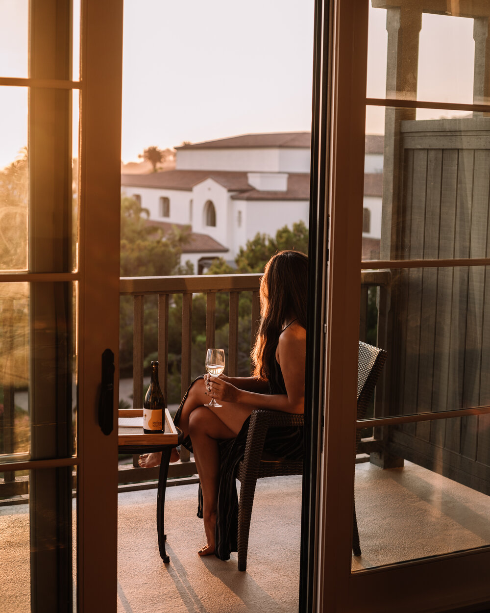 Rachel Off Duty: Woman with a Glass of Wine on Balcony at Sunset in Terranea Resort