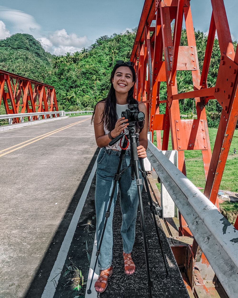 Rachel Off Duty: Woman on a Bridge with a Camera in the Philippines