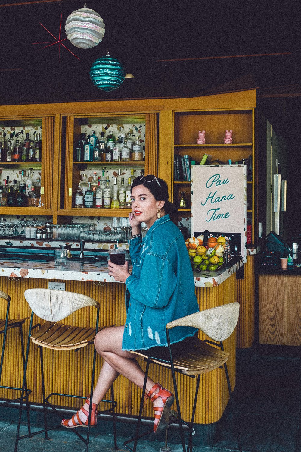 Rachel Off Duty: Woman Sitting at The Laylow Hotel Bar