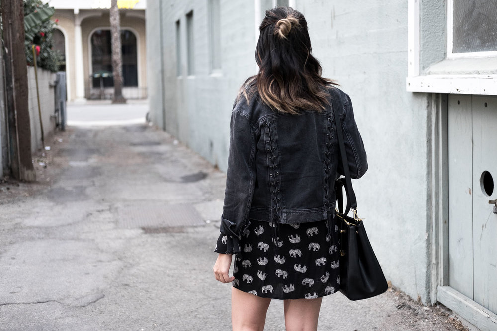 Rachel Off Duty: Woman Walking Down the Street Wearing a Black Jacket