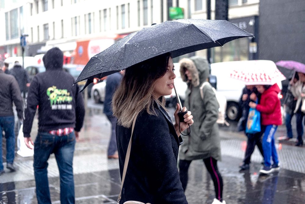 Rachel Off Duty: Woman Holding an Umbrella in Buchanan Street
